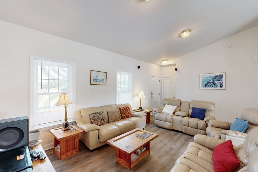 Two-story, lakefront getaway with dock, beach, grill, 2 kayaks, 2 canoes, AC