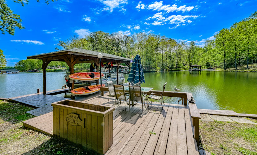 Serene lakefront home with free WiFi, private dock, game room, & central AC