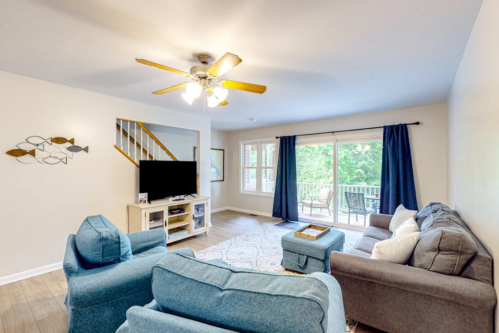 Lakefront home with kayaks, private patio, air hockey, grill, & balcony