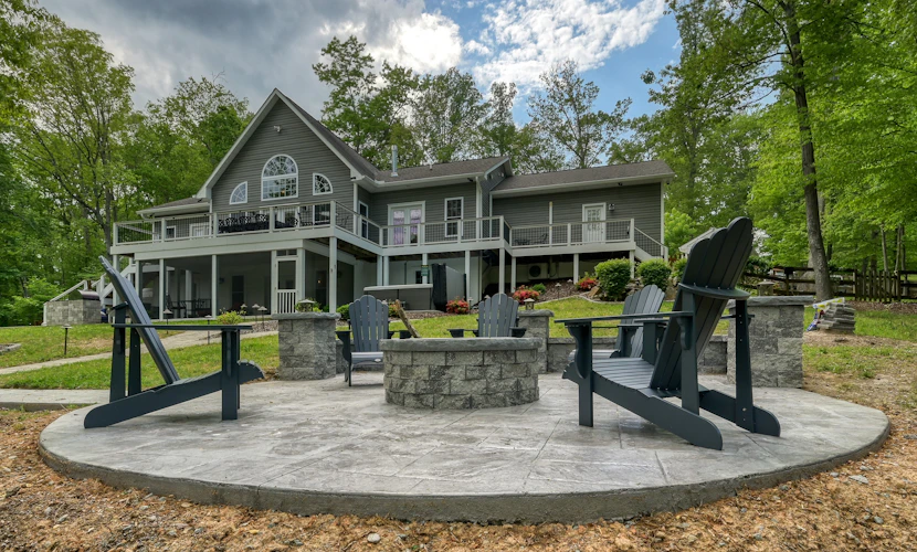 Sprawling waterfront home with kayaks, game room, and hot tub