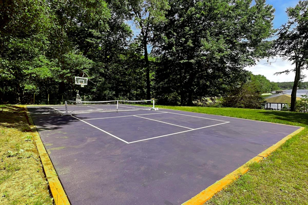 Lakefront home in private location with dock, firepit, game room & Pickleball