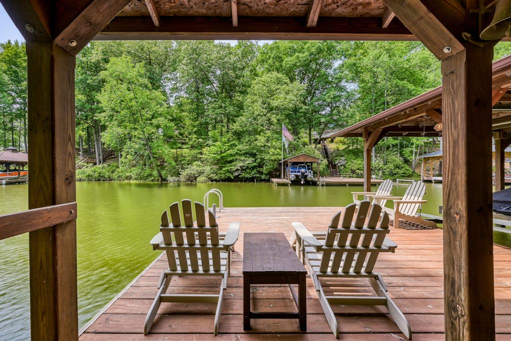 Waterfront cabin with private dock, hot tub, sundeck, outdoor areas, & W/D