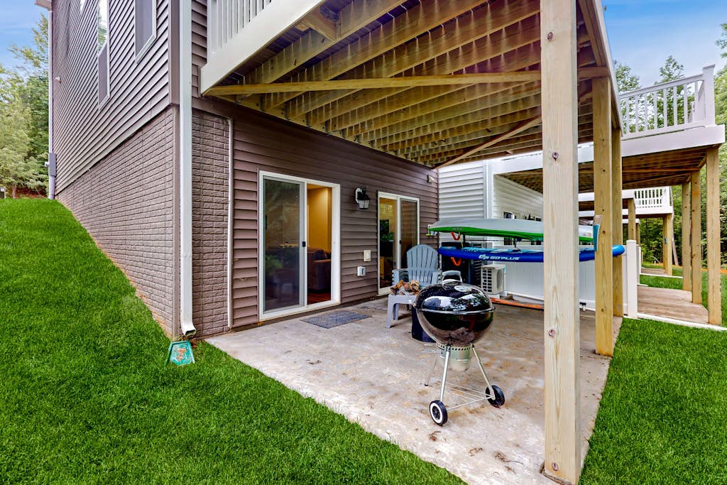 Charming lakefront retreat with game room and covered dock access