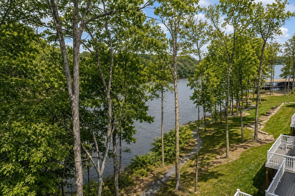 Charming lakefront retreat with game room and covered dock access