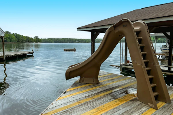 Lakefront house w/waterslide, hot tub, game room, & wood fireplace