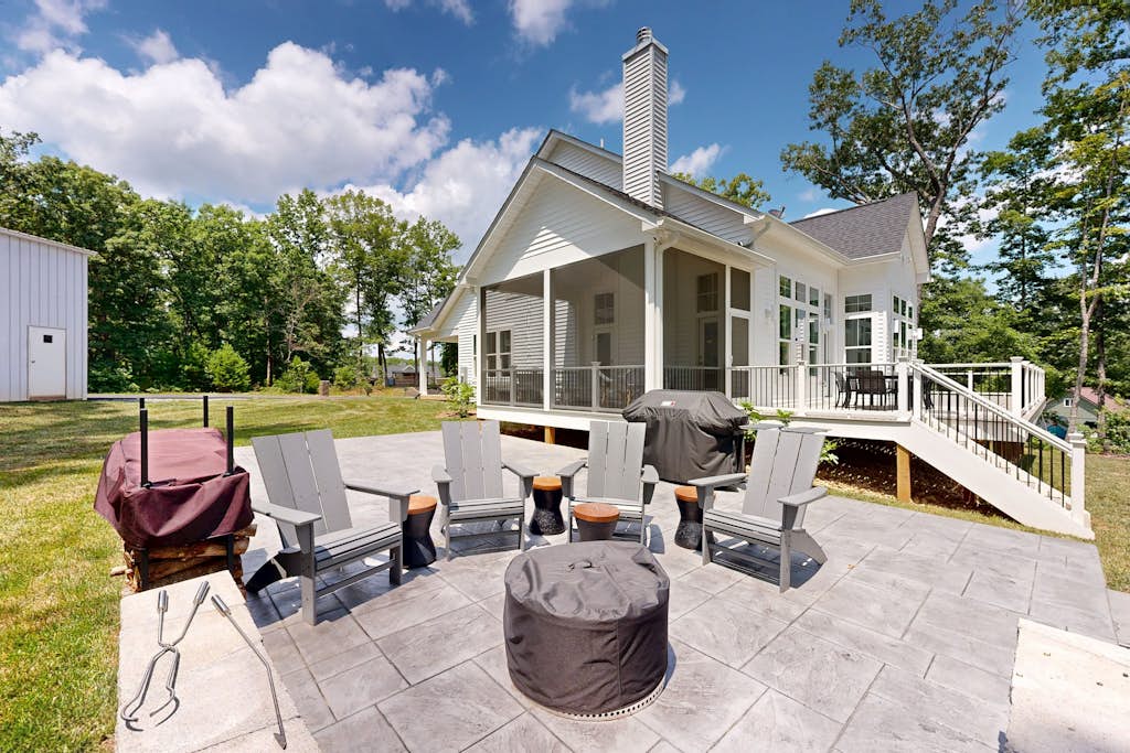 Spacious lake house retreat with game room, theater room, fire pit and boat slip