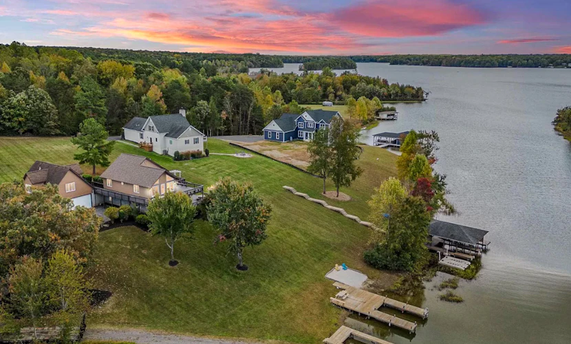 Updated lakefront home & studio with water views, hot tub, dock & game room