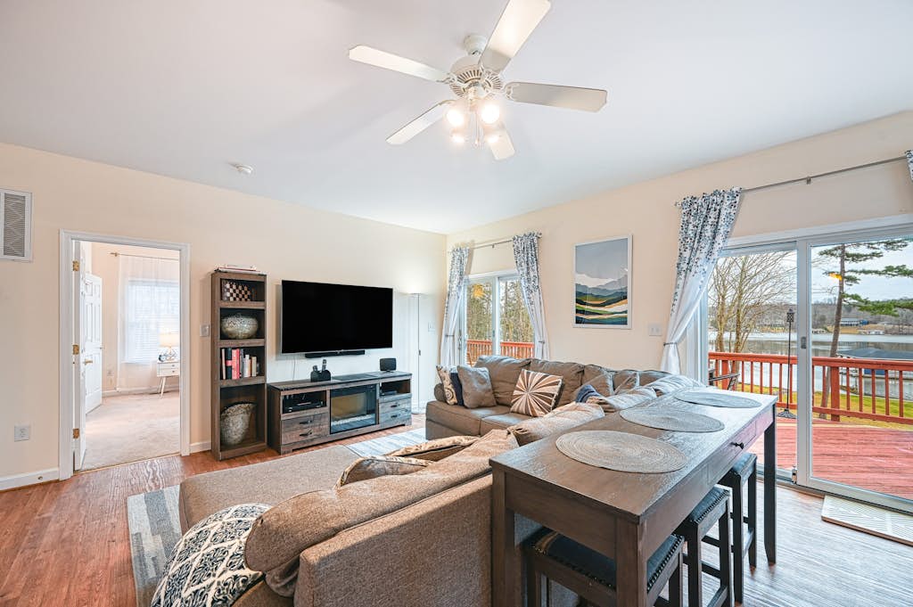 Lakeside retreat with a firepit, dock, deck, hot tub, pool table - dog friendly