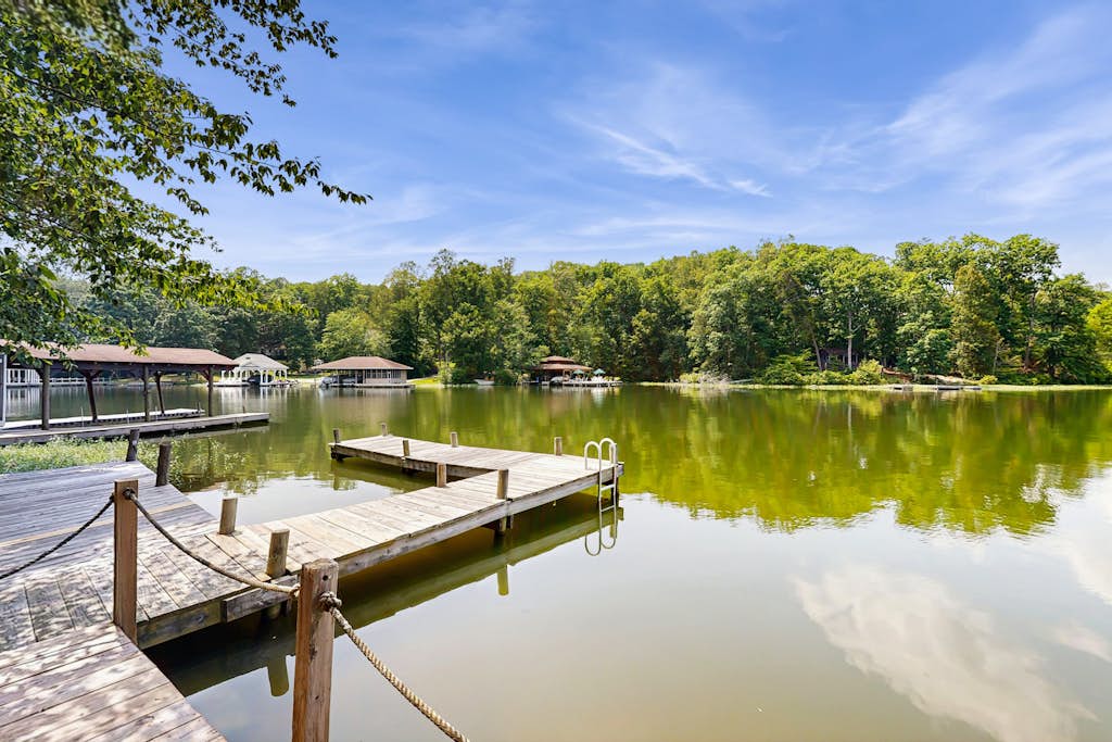 Lakefront Escape with Private Docks, Three-Season Room, and Spacious Bunk Room