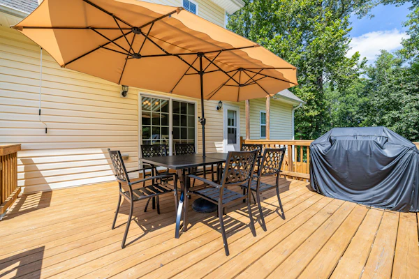 Lakeview escape near beach with fenced dog run, porch & dock with one boat slip