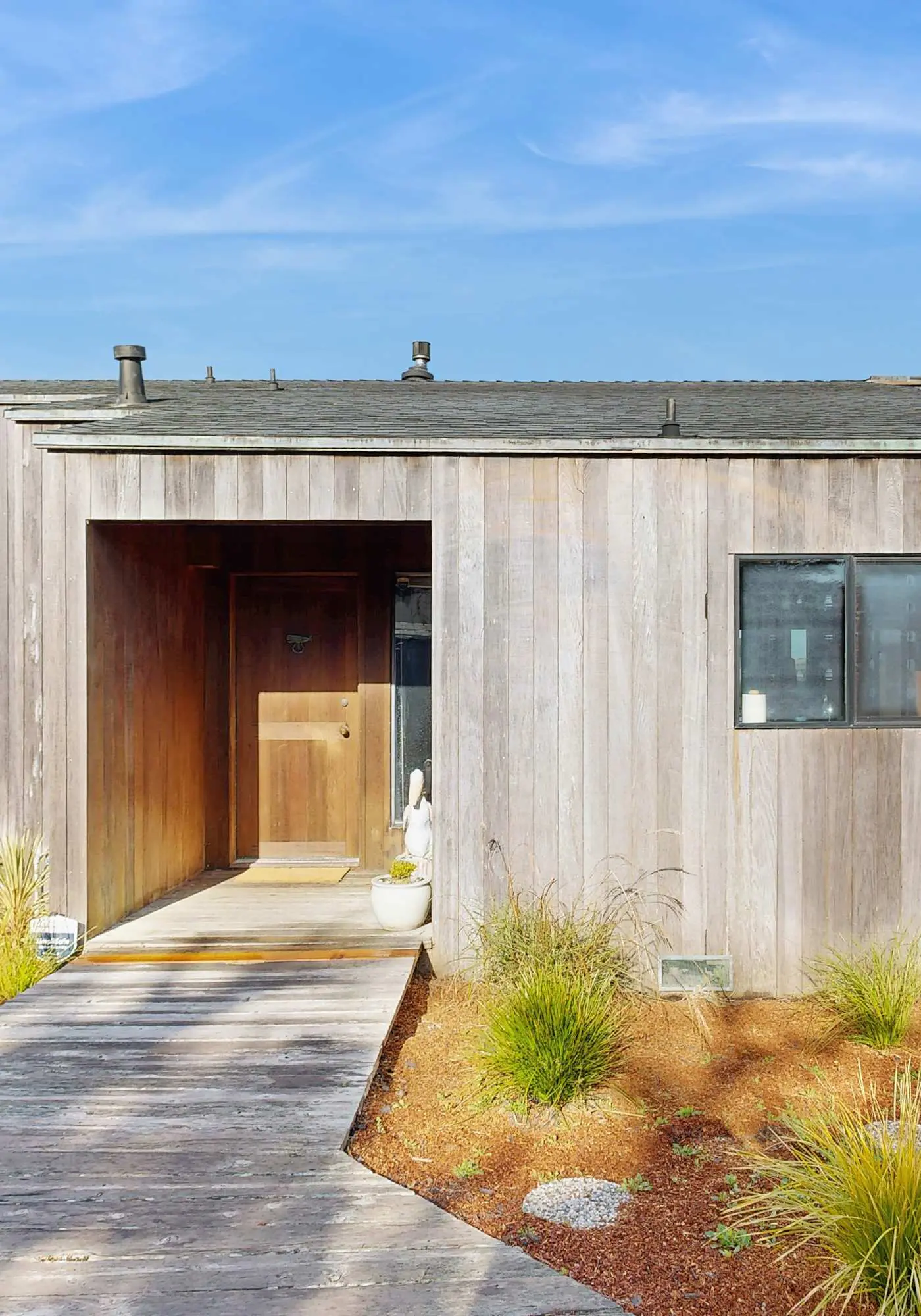 Ocean view home with stone fireplace, dog-friendly