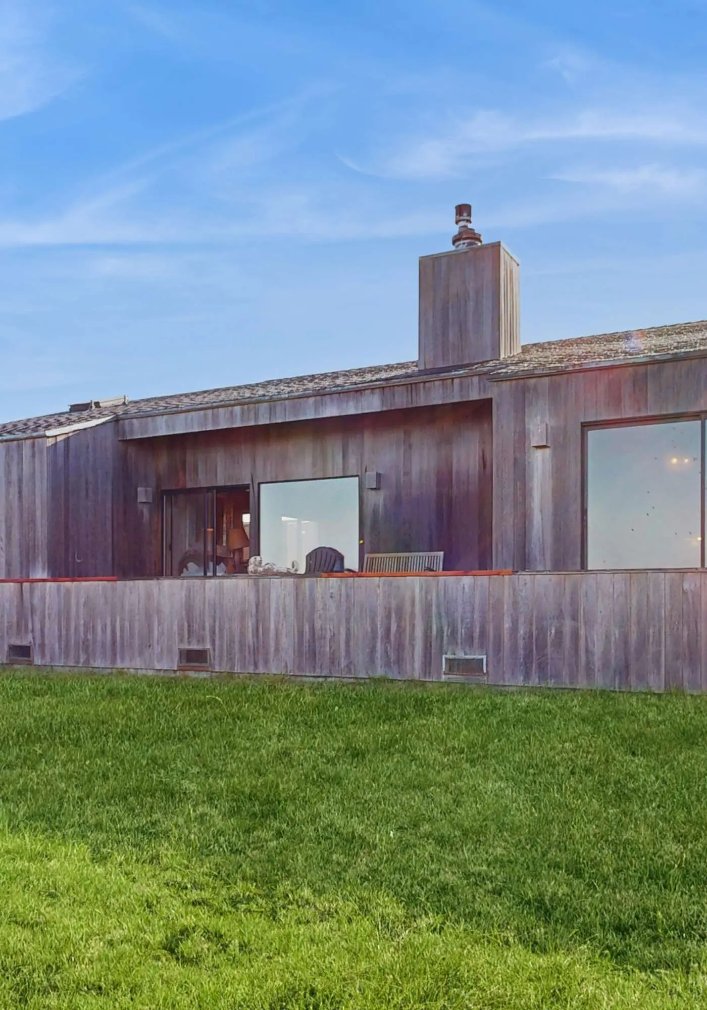 Ocean view home with stone fireplace, dog-friendly