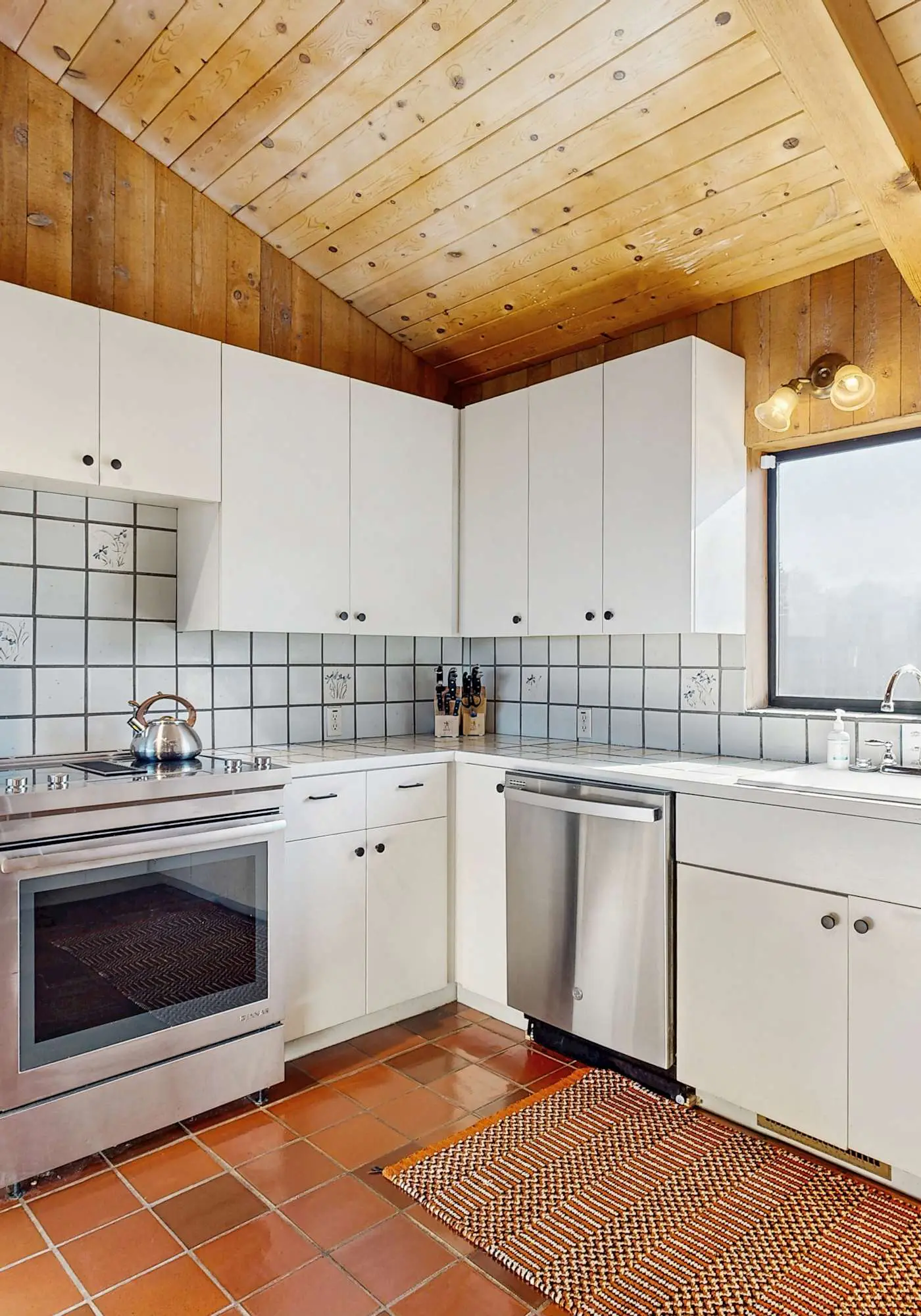 Ocean view home with stone fireplace, dog-friendly