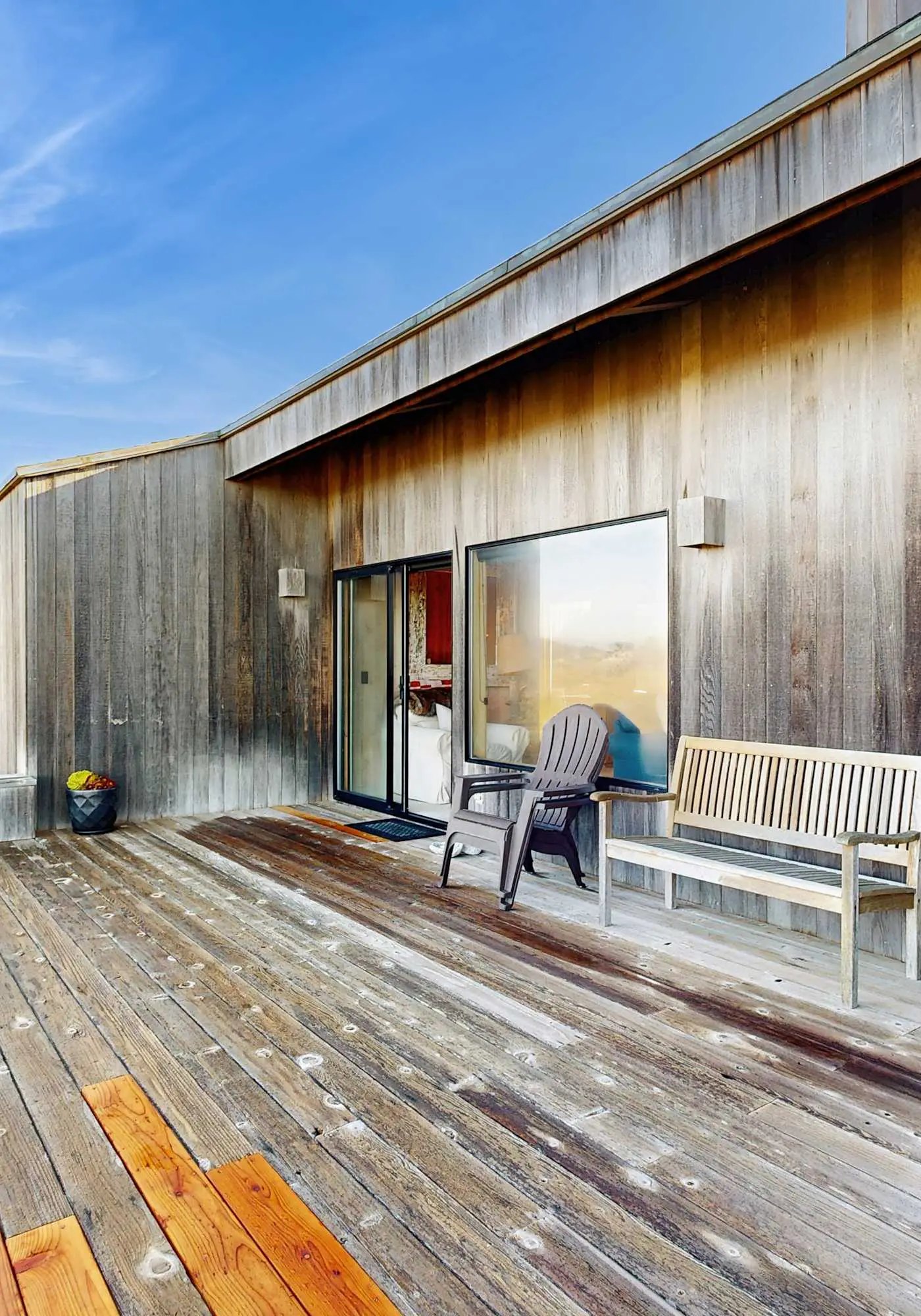 Ocean view home with stone fireplace, dog-friendly