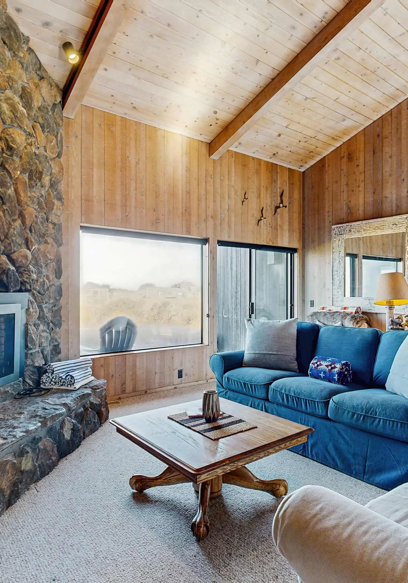 Ocean view home with stone fireplace, dog-friendly