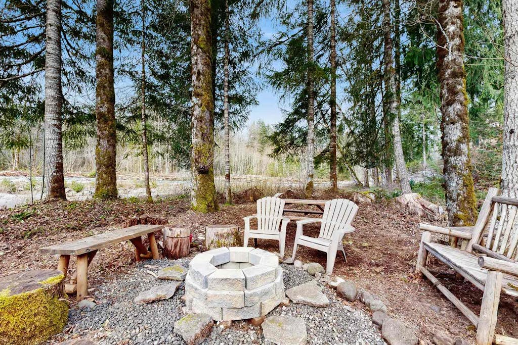 Riverfront retreat with panoramic river and forest views