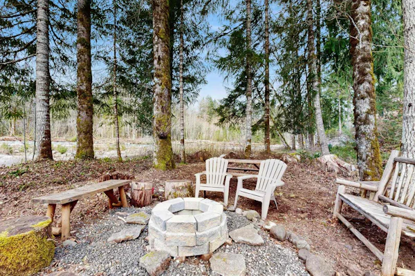 Riverfront retreat with panoramic river and forest views