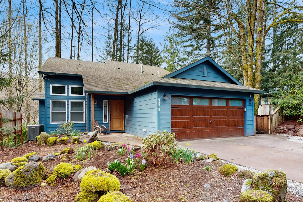 Riverfront retreat with panoramic river and forest views