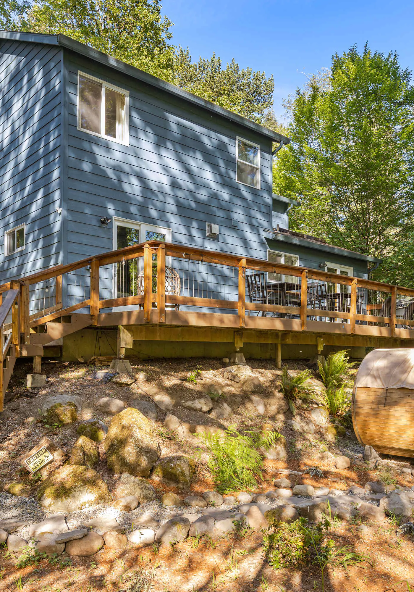 Riverfront retreat with panoramic river and forest views