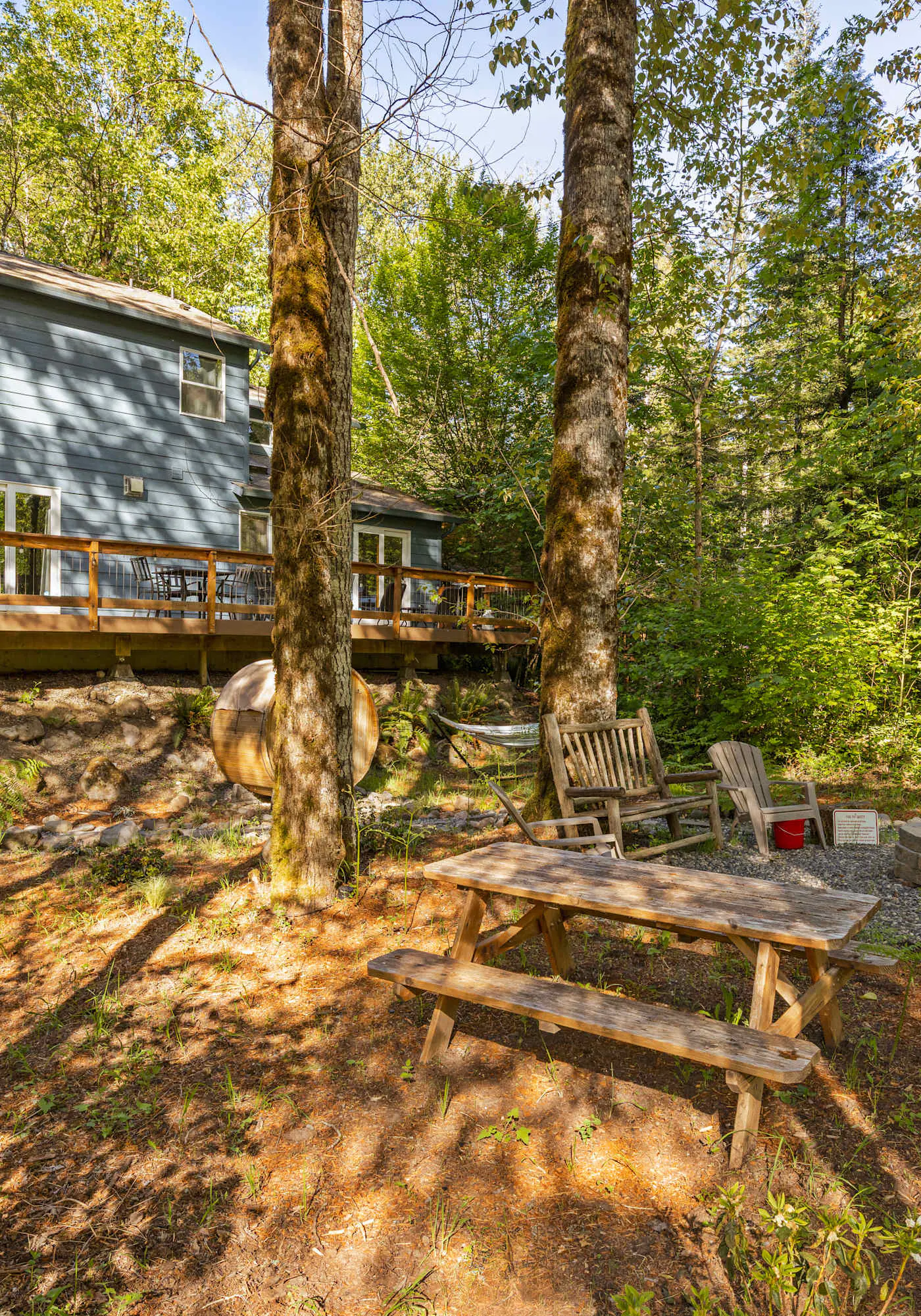 Riverfront retreat with panoramic river and forest views