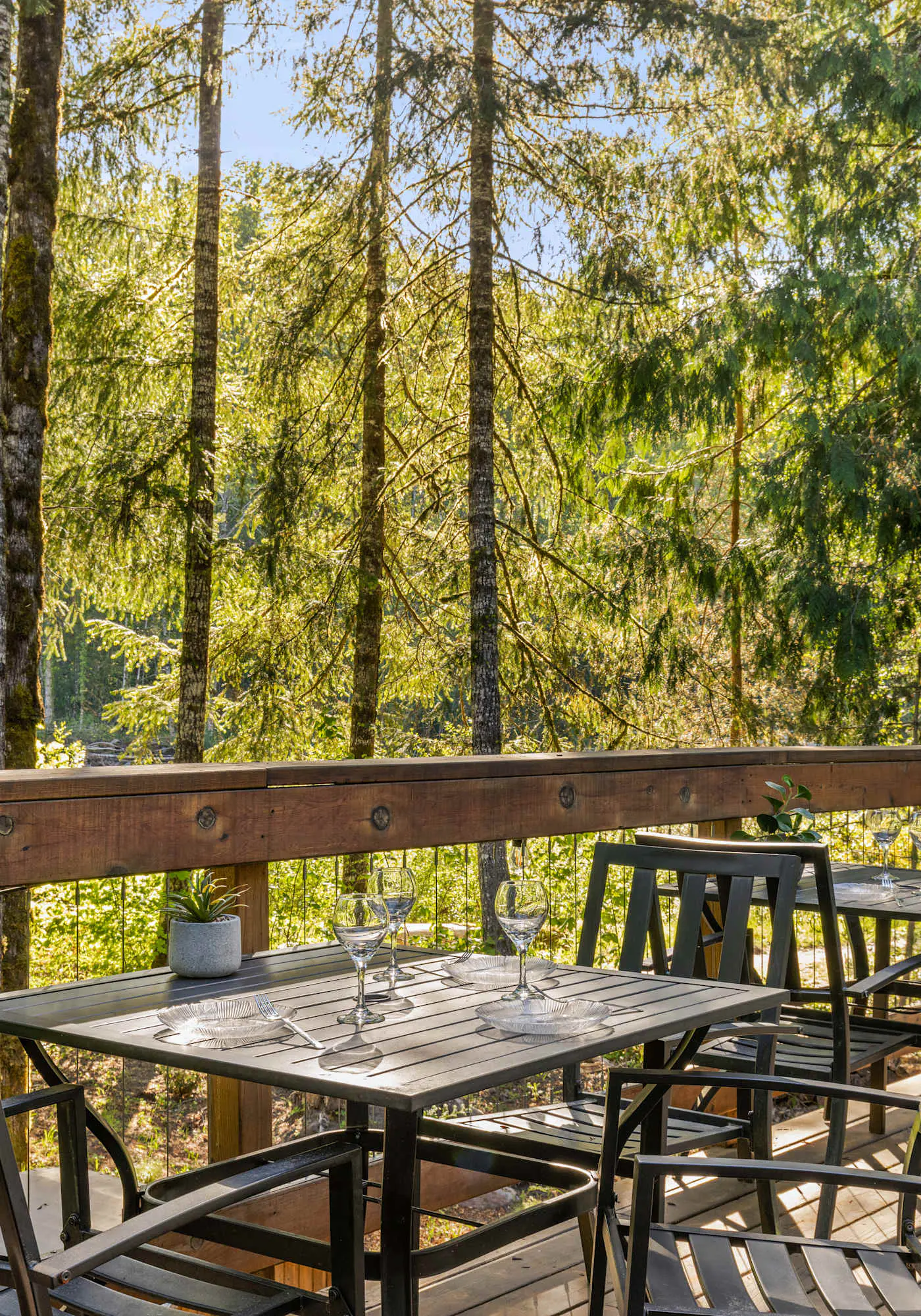 Riverfront retreat with panoramic river and forest views