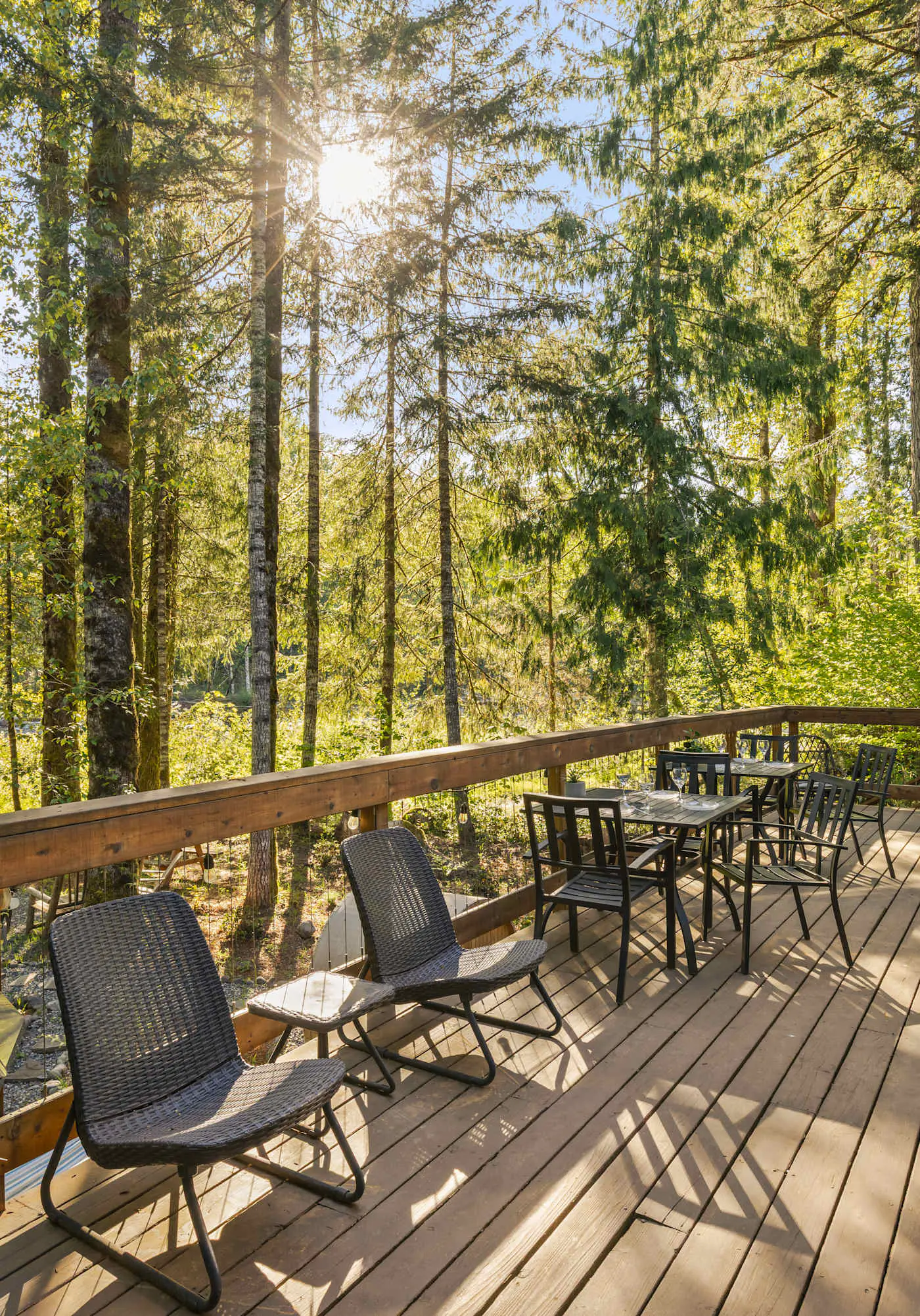 Riverfront retreat with panoramic river and forest views