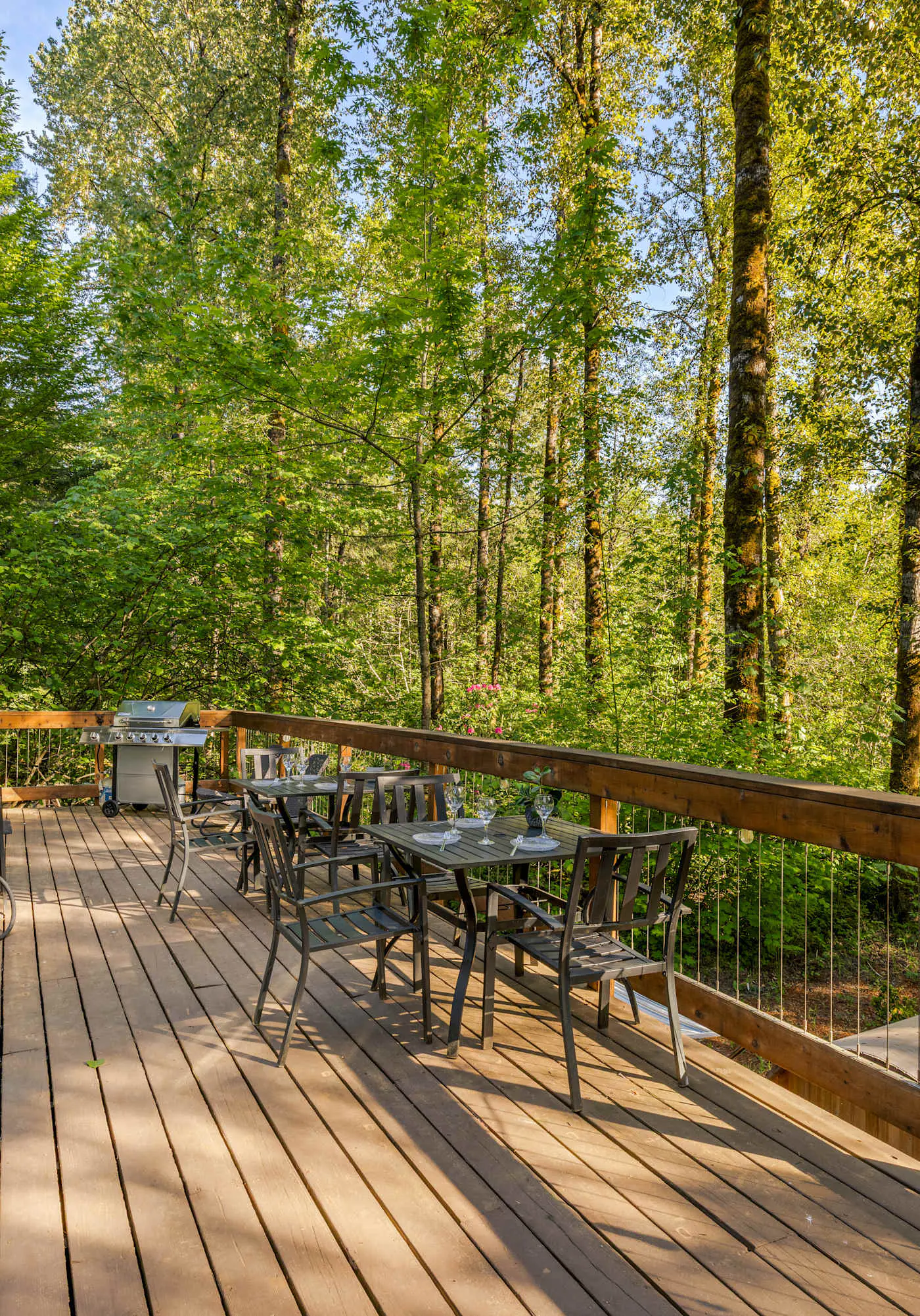 Riverfront retreat with panoramic river and forest views