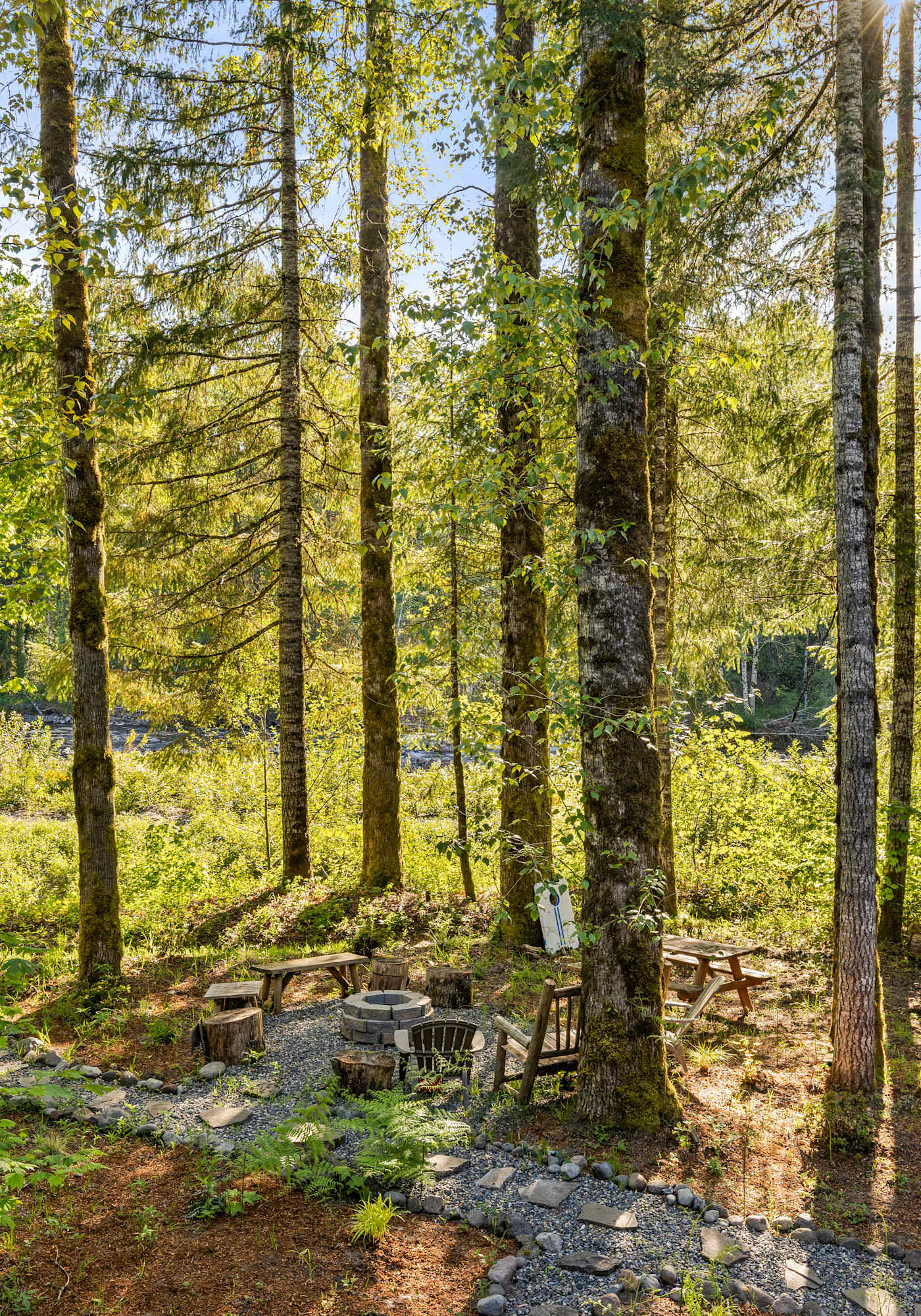 Riverfront retreat with panoramic river and forest views
