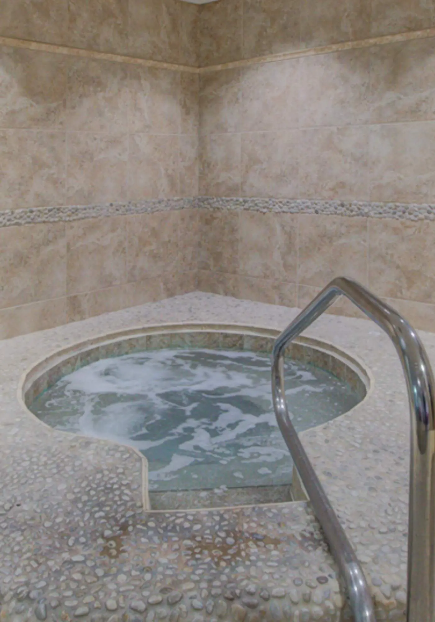 Gorgeous gulf front condo with pools, hot tub, and gym