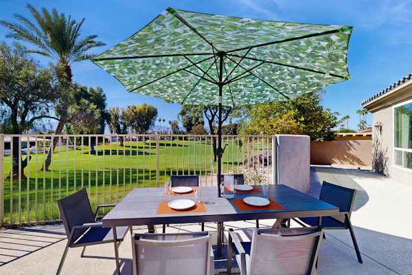 Inviting dog-friendly home w/pool, outdoor kitchen + mountain & golf course view