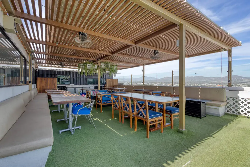Dog-friendly hotel suite with ocean-view rooftop infinity pool, central AC & gym
