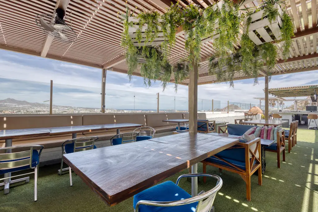 Dog-friendly hotel suite with ocean-view rooftop infinity pool, central AC & gym