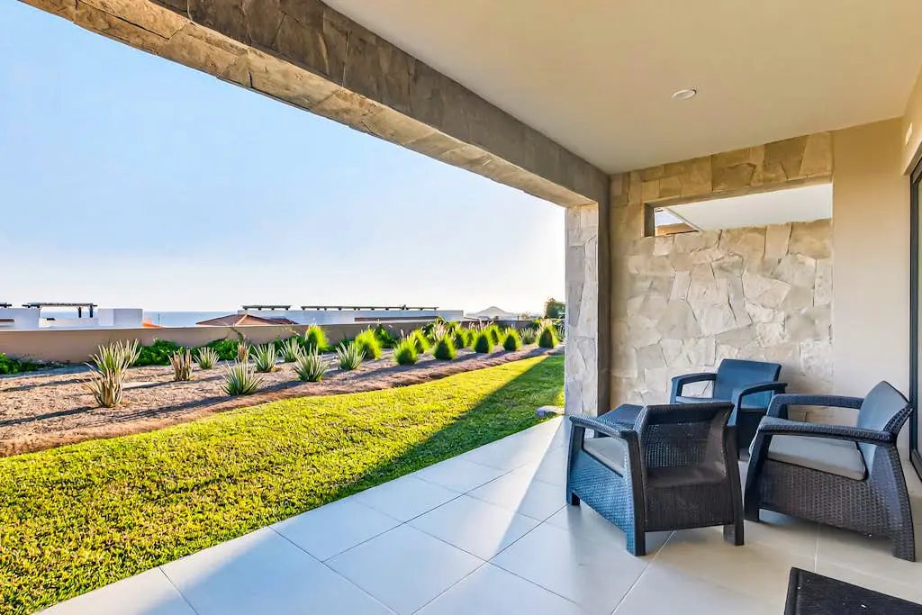 Modern apartment with. ocean view, pool, patio, tennis, & gym