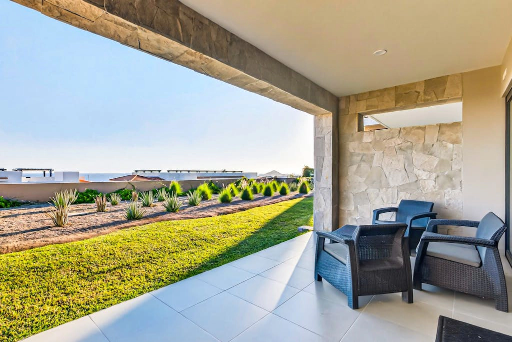 Modern apartment with. ocean view, pool, patio, tennis, & gym