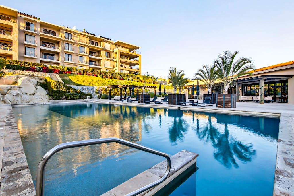 Modern apartment with. ocean view, pool, patio, tennis, & gym