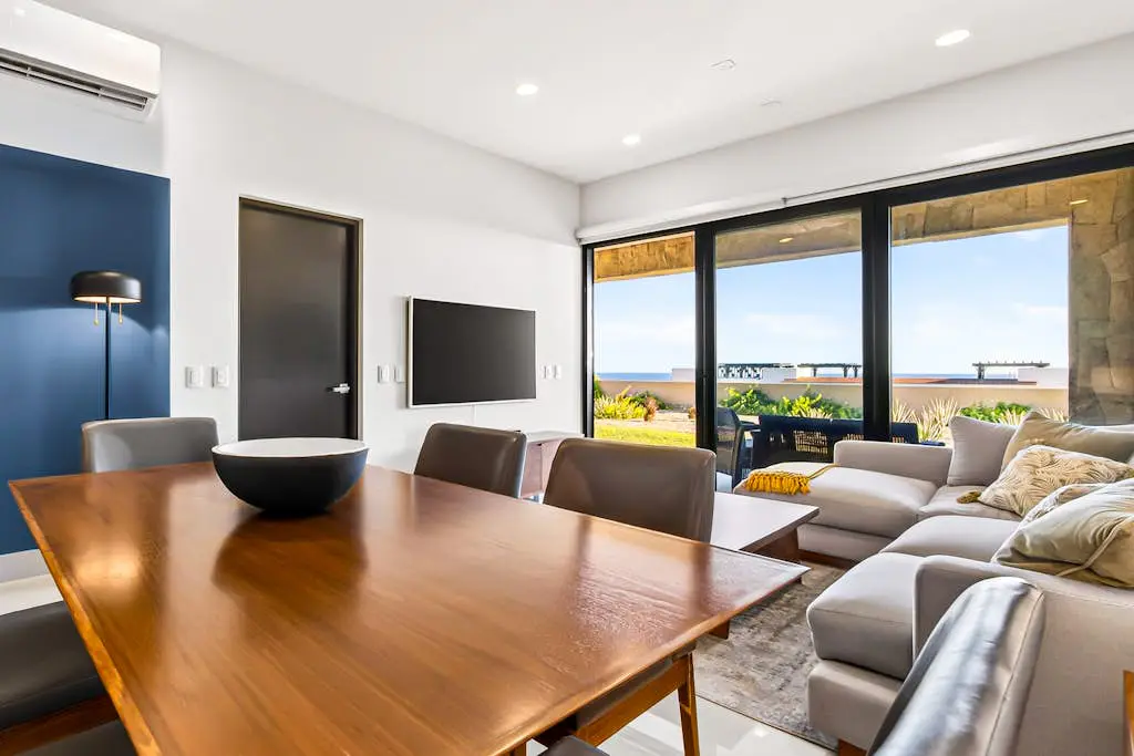 Modern apartment with. ocean view, pool, patio, tennis, & gym