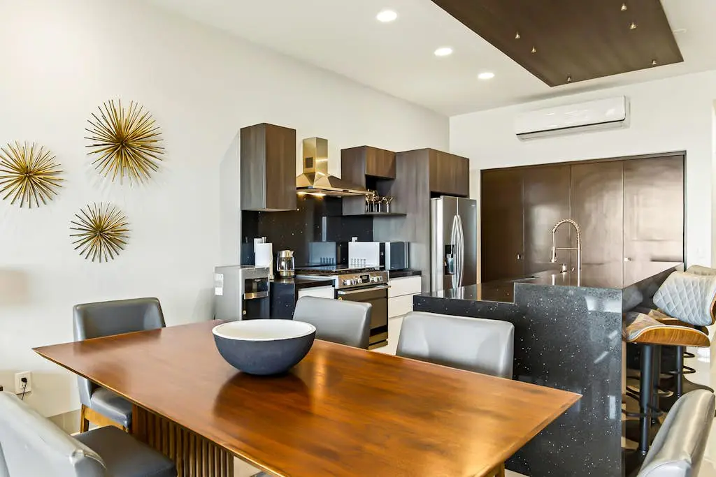 Modern apartment with. ocean view, pool, patio, tennis, & gym