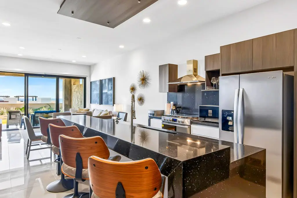Modern apartment with. ocean view, pool, patio, tennis, & gym