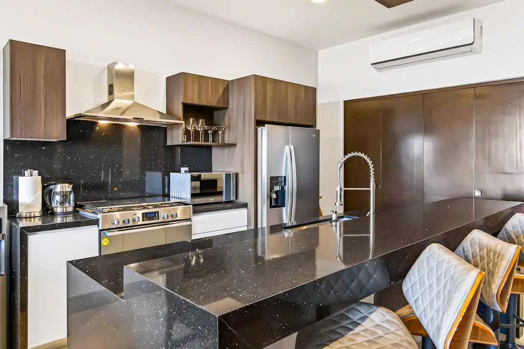 Modern apartment with. ocean view, pool, patio, tennis, & gym