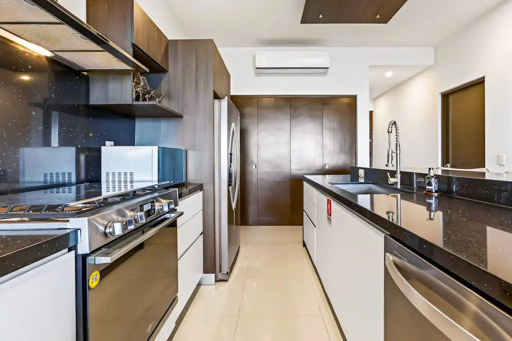 Modern apartment with. ocean view, pool, patio, tennis, & gym