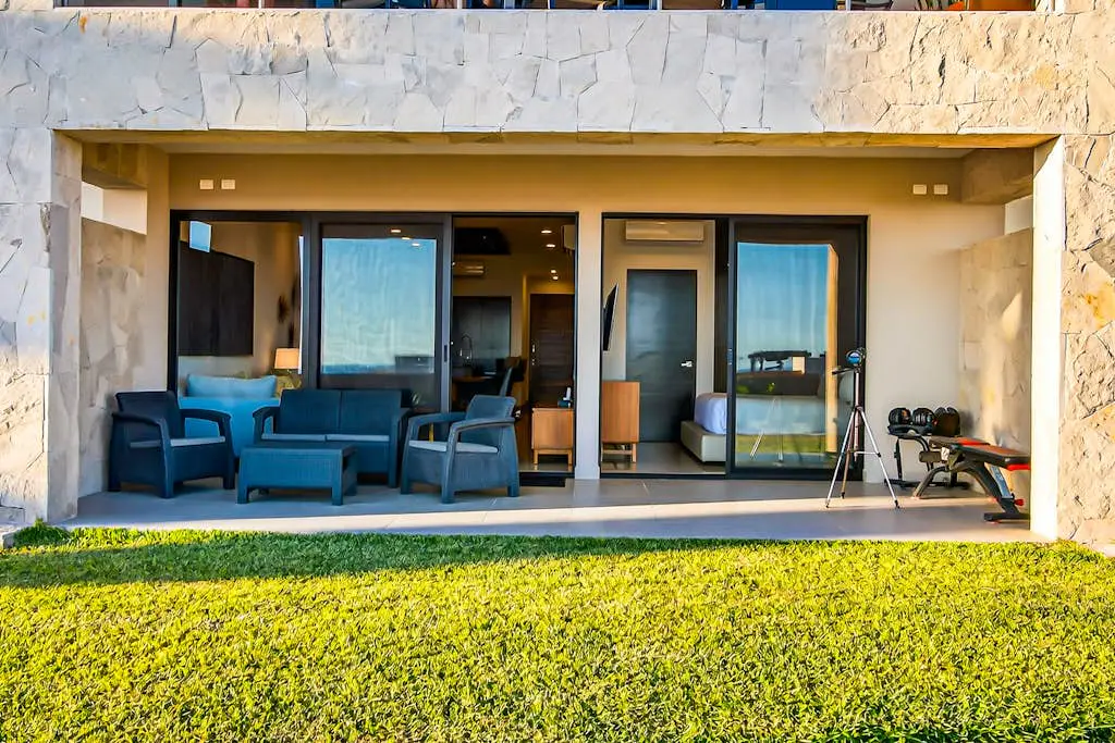 Modern apartment with. ocean view, pool, patio, tennis, & gym