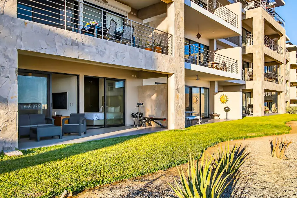 Modern apartment with. ocean view, pool, patio, tennis, & gym