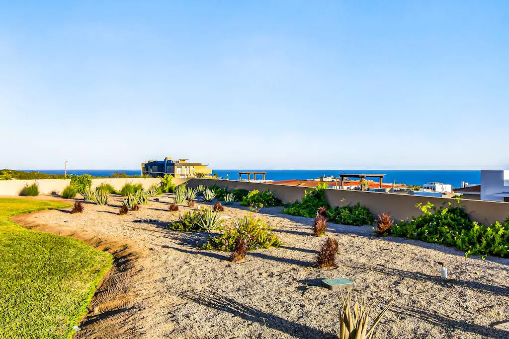 Modern apartment with. ocean view, pool, patio, tennis, & gym
