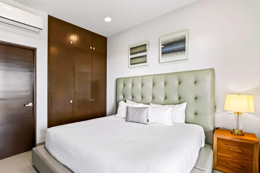 Modern apartment with. ocean view, pool, patio, tennis, & gym