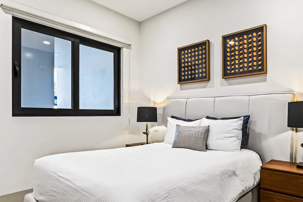 Modern apartment with. ocean view, pool, patio, tennis, & gym