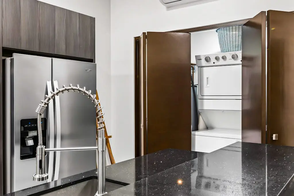 Modern apartment with. ocean view, pool, patio, tennis, & gym
