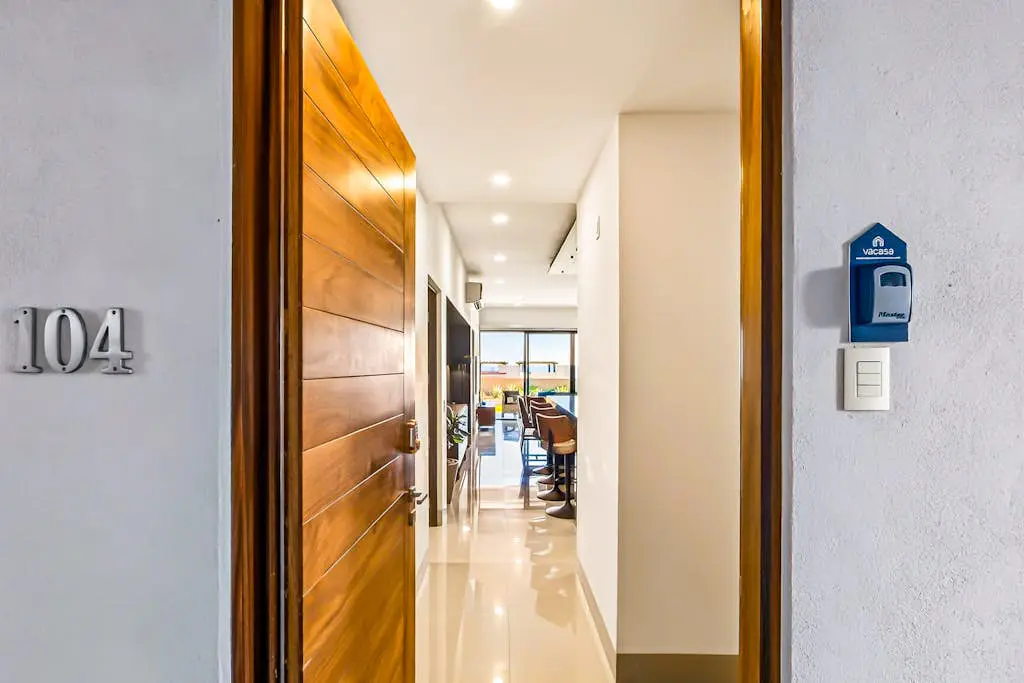 Modern apartment with. ocean view, pool, patio, tennis, & gym