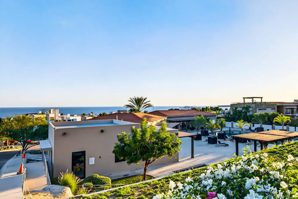 Modern apartment with. ocean view, pool, patio, tennis, & gym