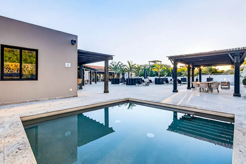 Modern apartment with. ocean view, pool, patio, tennis, & gym