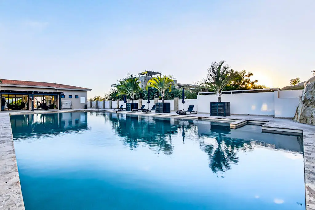 Modern apartment with. ocean view, pool, patio, tennis, & gym